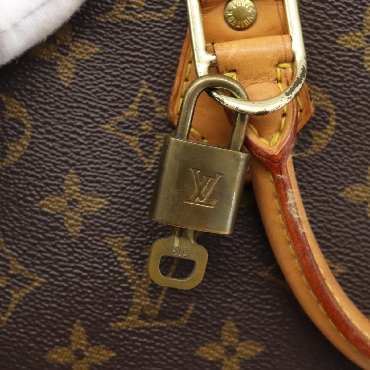 Louis Vuitton Alma Monogram Canvas Brown Canvas Handbag (Pre-Owned)