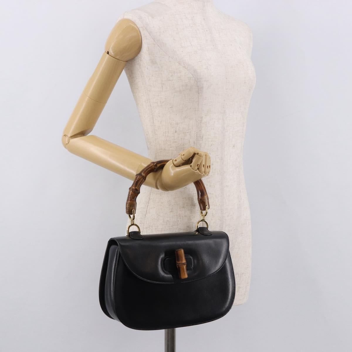 Gucci Vintage Convertible Bamboo Top Handle Leather Black Leather Handbag (Pre-Owned)