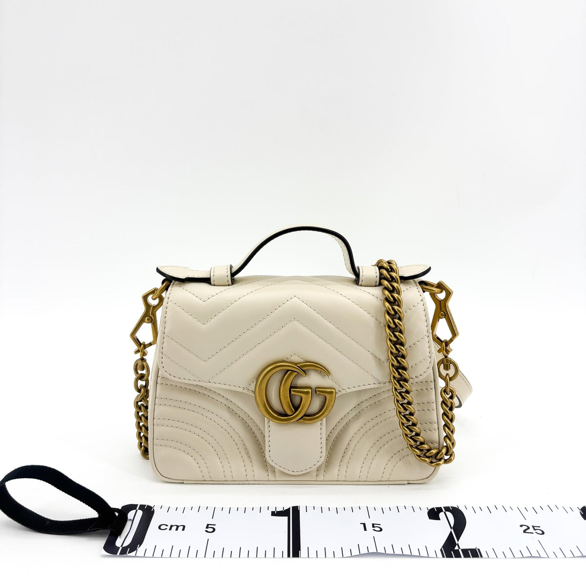 Gucci Gg Marmont Top Handle Flap Matelasse Leather White Leather Handbag (Pre-Owned)