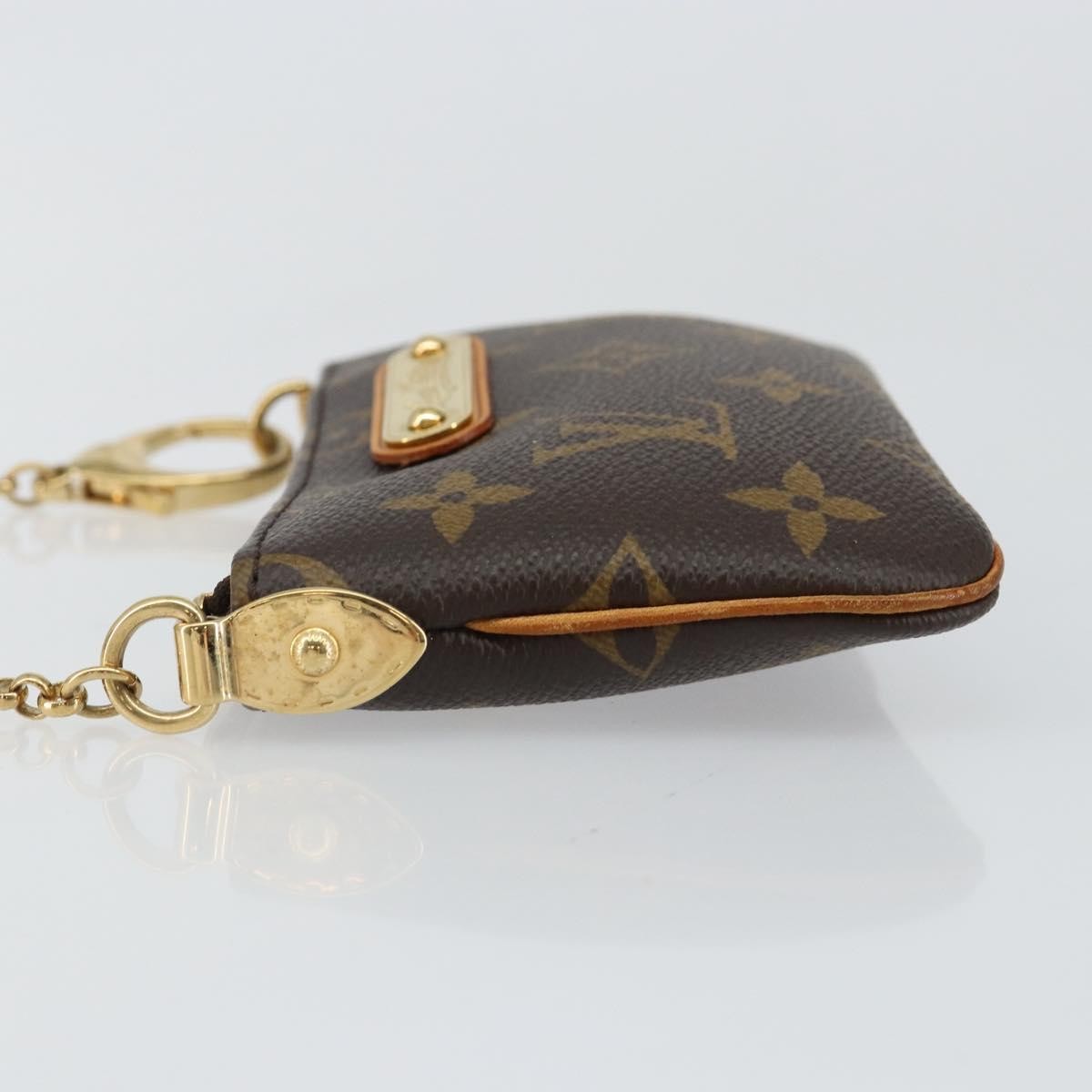 Louis Vuitton Milla Pochette Monogram Canvas Brown Canvas Clutche & Pouche Bag (Pre-Owned)