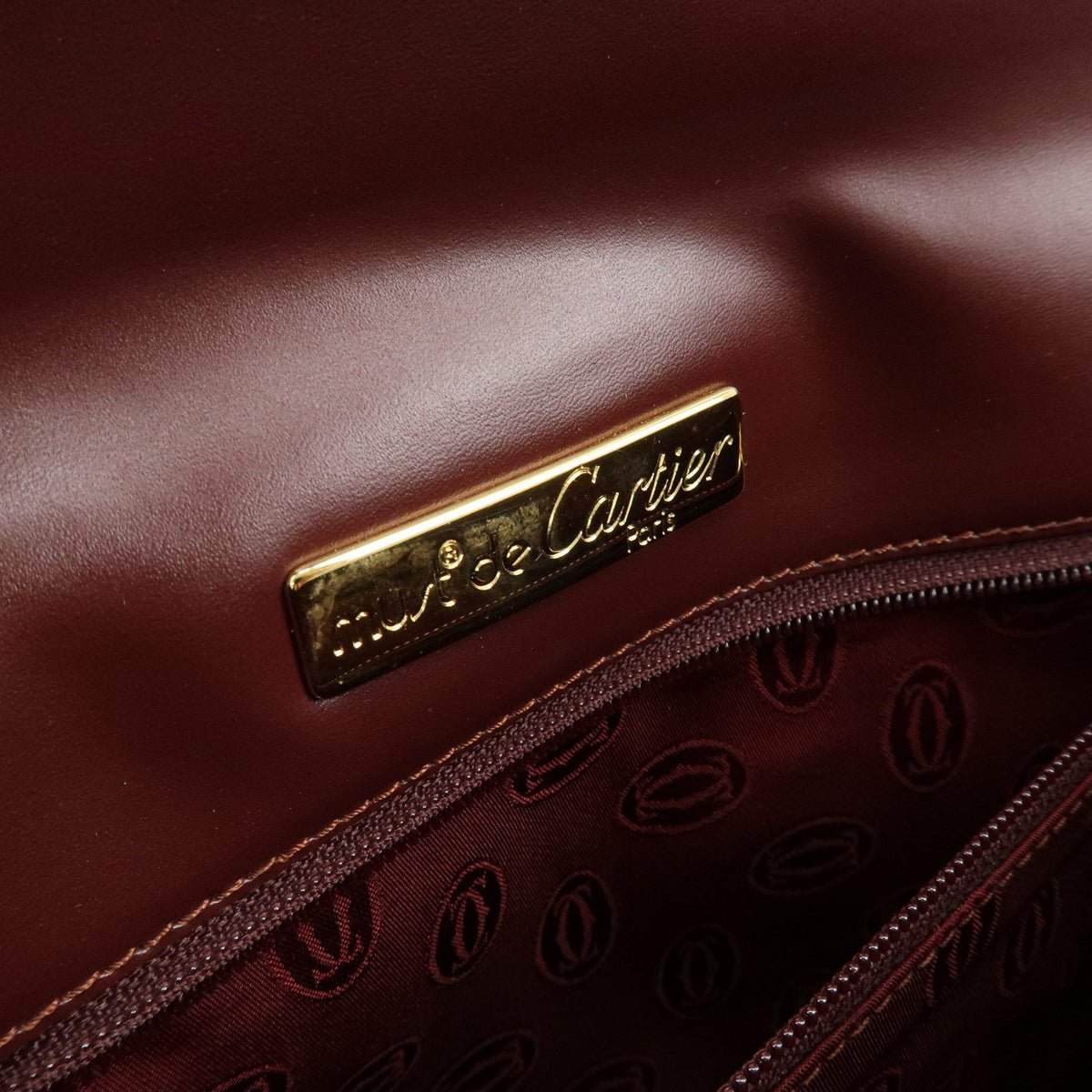 Cartier Must De Cartier Clutch Leather Burgundy Leather Clutche & Pouche Bag (Pre-Owned)