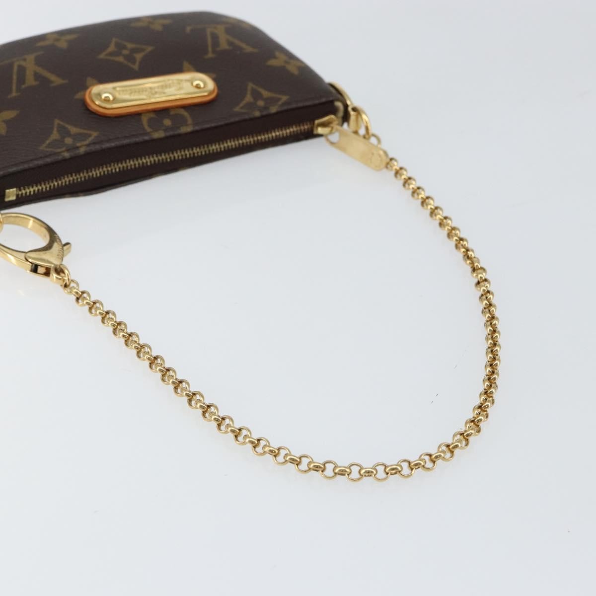 Louis Vuitton Milla Pochette Monogram Canvas Brown Canvas Clutche & Pouche Bag (Pre-Owned)