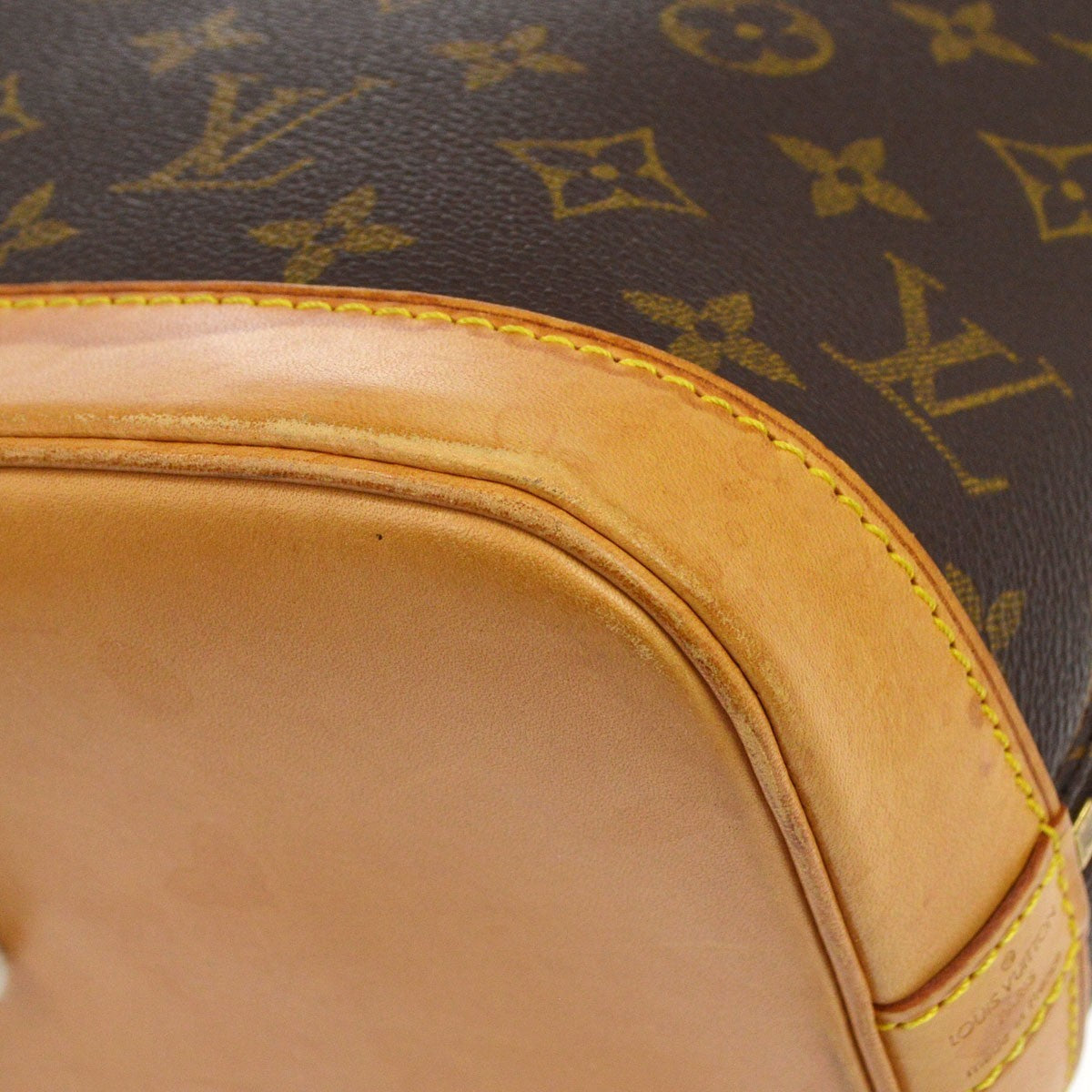 Louis Vuitton Alma Monogram Canvas Brown Canvas Handbag (Pre-Owned)