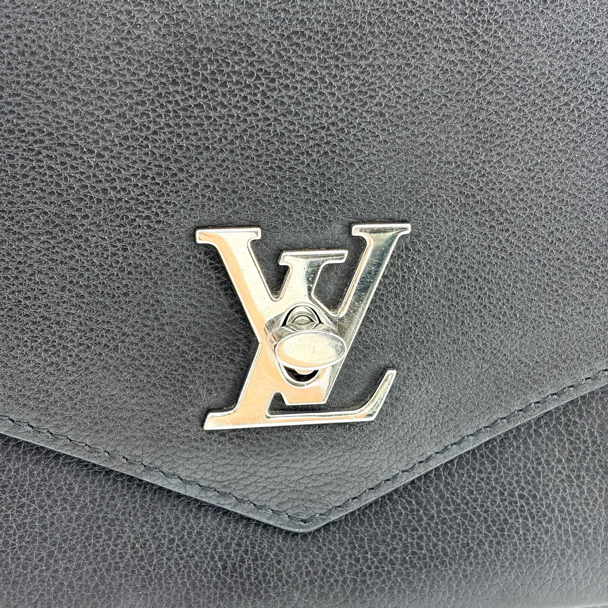 Louis Vuitton Mylockme Monochrome Leather Black Leather Handbag (Pre-Owned)