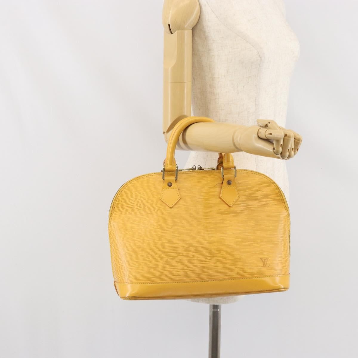 Louis Vuitton Alma Epi Leather Yellow Leather Handbag (Pre-Owned)
