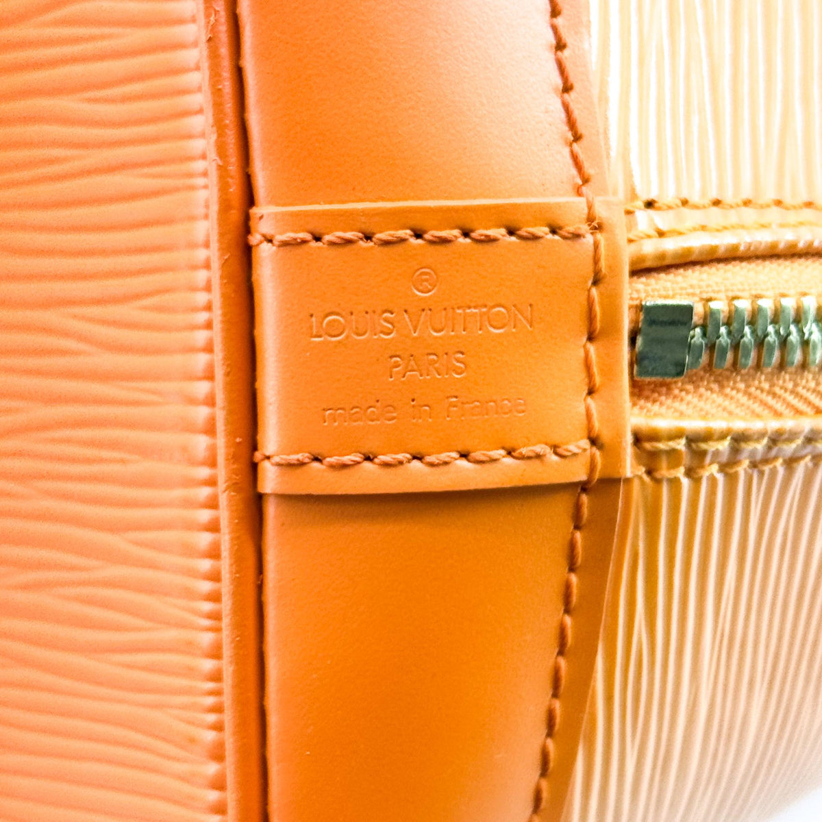 Louis Vuitton Alma Epi Leather Orange Leather Handbag (Pre-Owned)