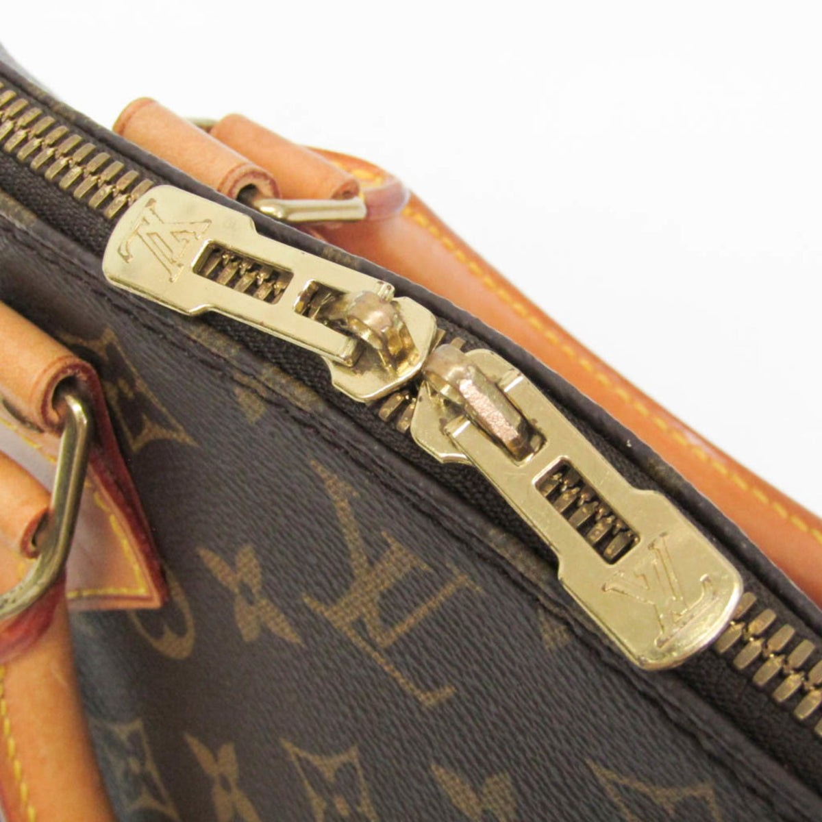 Louis Vuitton Alma Monogram Brown Canvas Handbag (Pre-Owned)