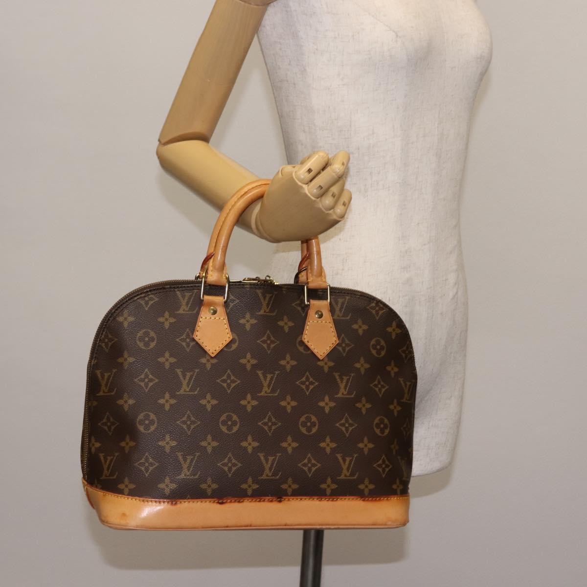 Louis Vuitton Alma Monogram Canvas Brown Canvas Handbag (Pre-Owned)