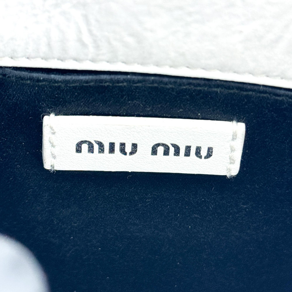 Miu Miu Matelassé Nappa Leather Top Handle Bag Leather White Leather Clutche & Pouche Bag (Pre-Owned)