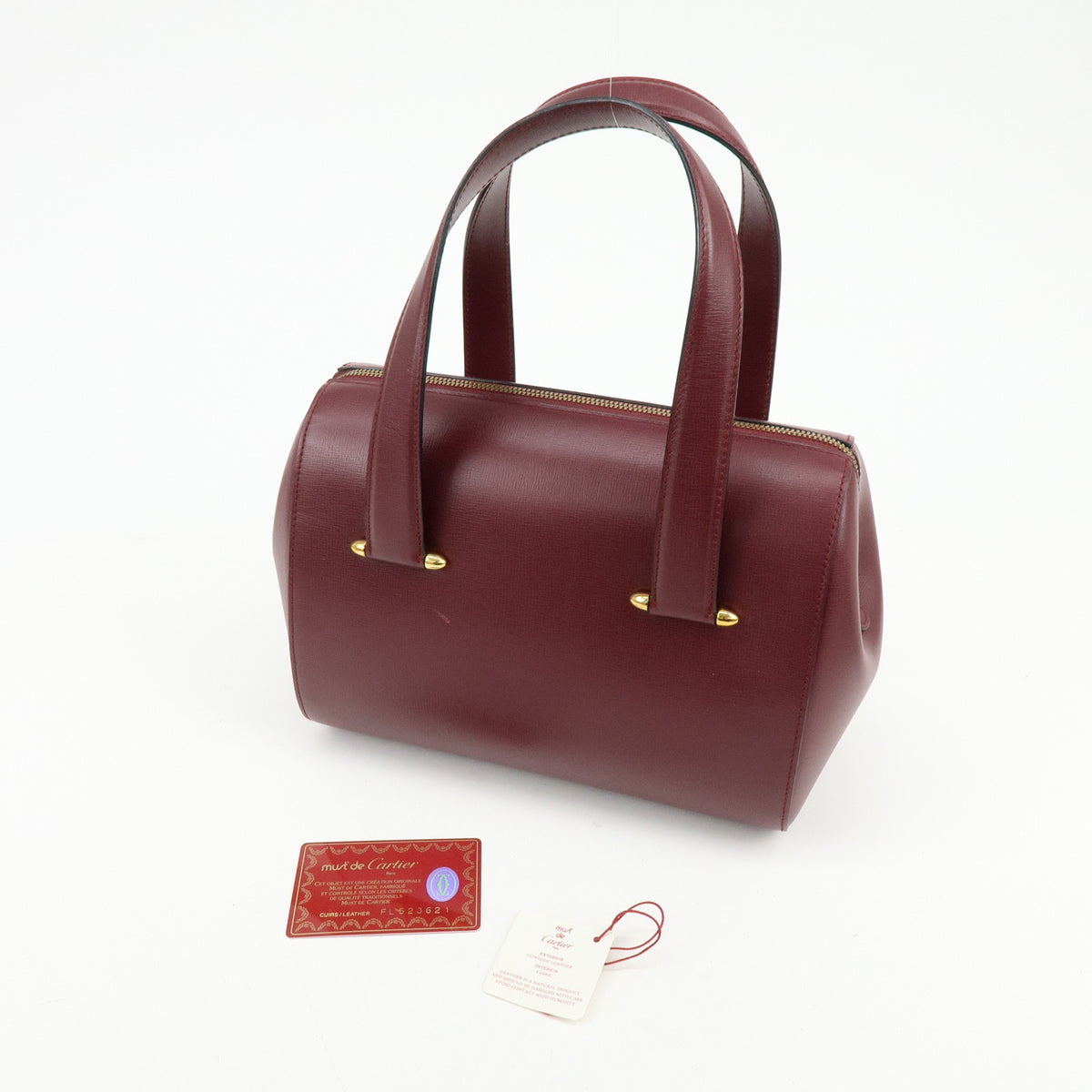 Cartier Must De Cartier Boston Leather Burgundy Leather Travel Bag Bag (Pre-Owned)
