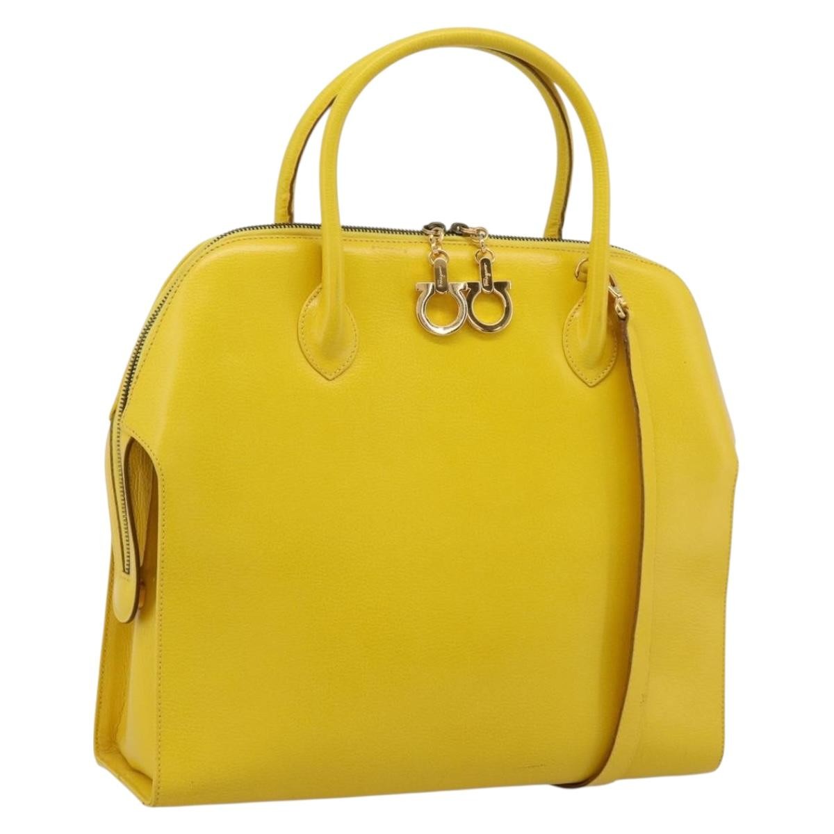 Salvatore Ferragamo Gancini Leather Yellow Leather Handbag (Pre-Owned)