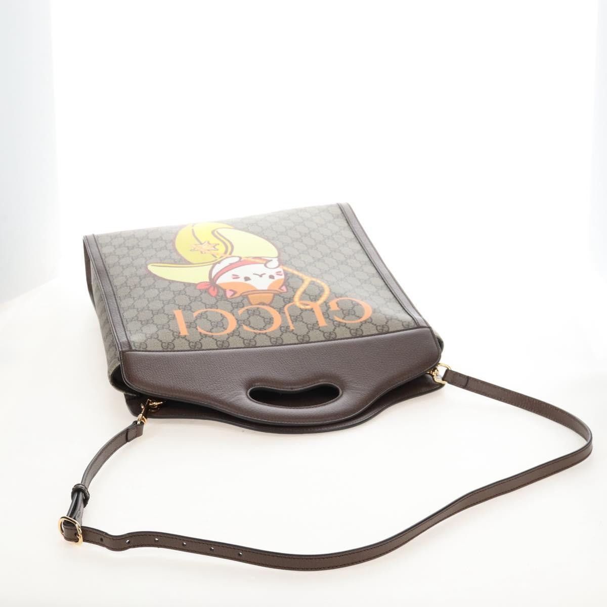 Gucci Cut Out Handle Printed Gg Coated Canvas Brown Canvas Tote Bag Bag (Pre-Owned)