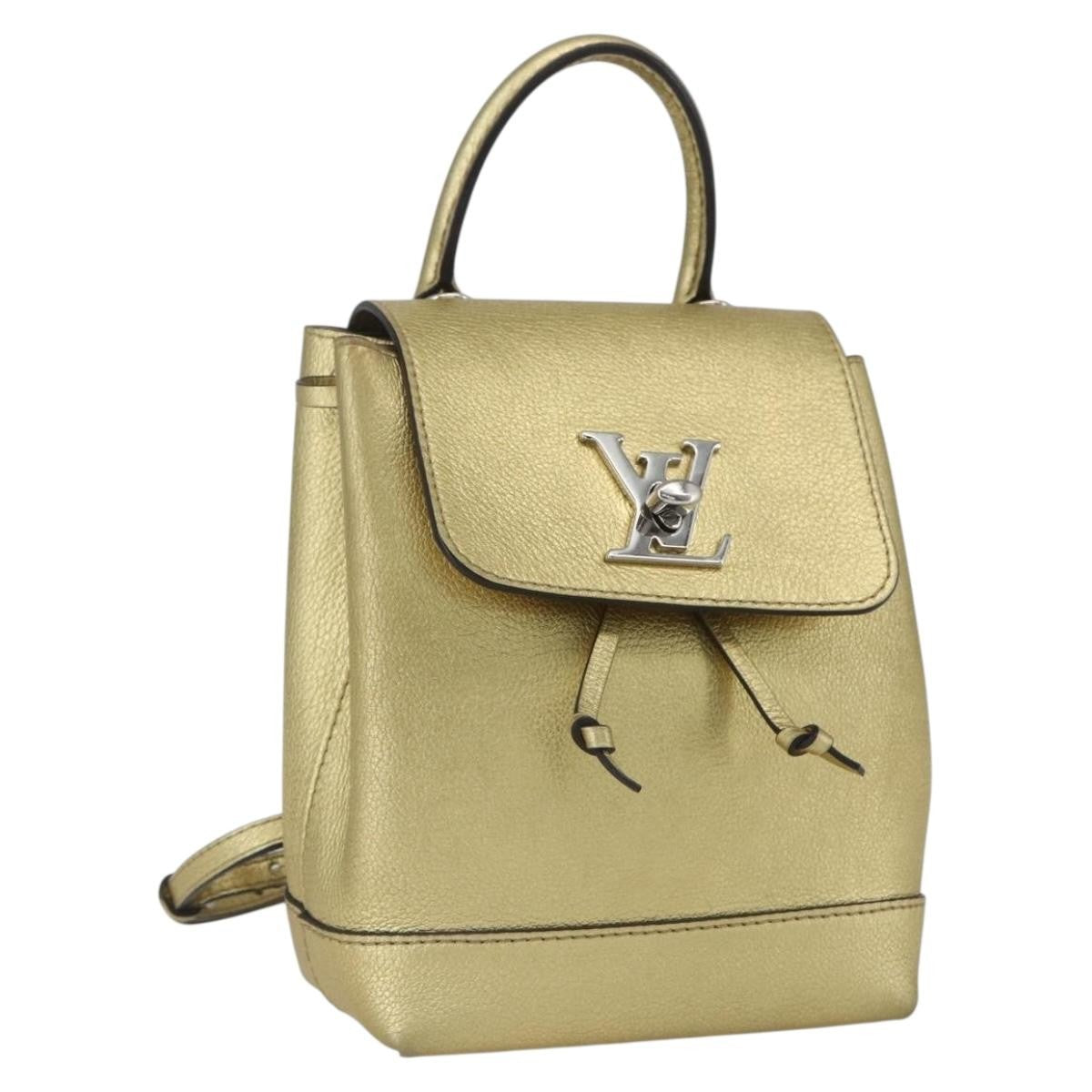 Louis Vuitton Lockme Leather Gold Leather Backpack Bag (Pre-Owned)