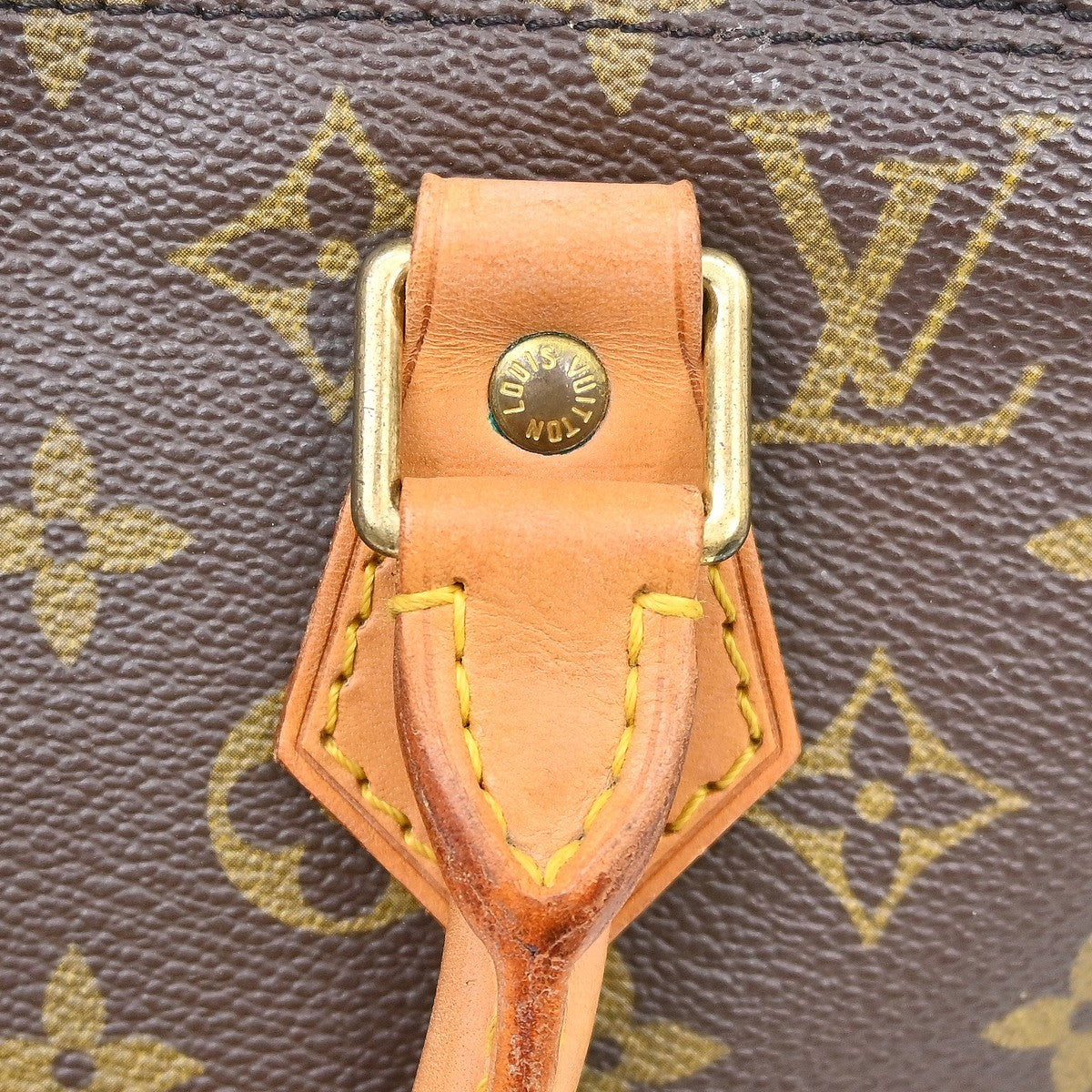 Louis Vuitton Alma Monogram Brown Canvas Handbag (Pre-Owned)