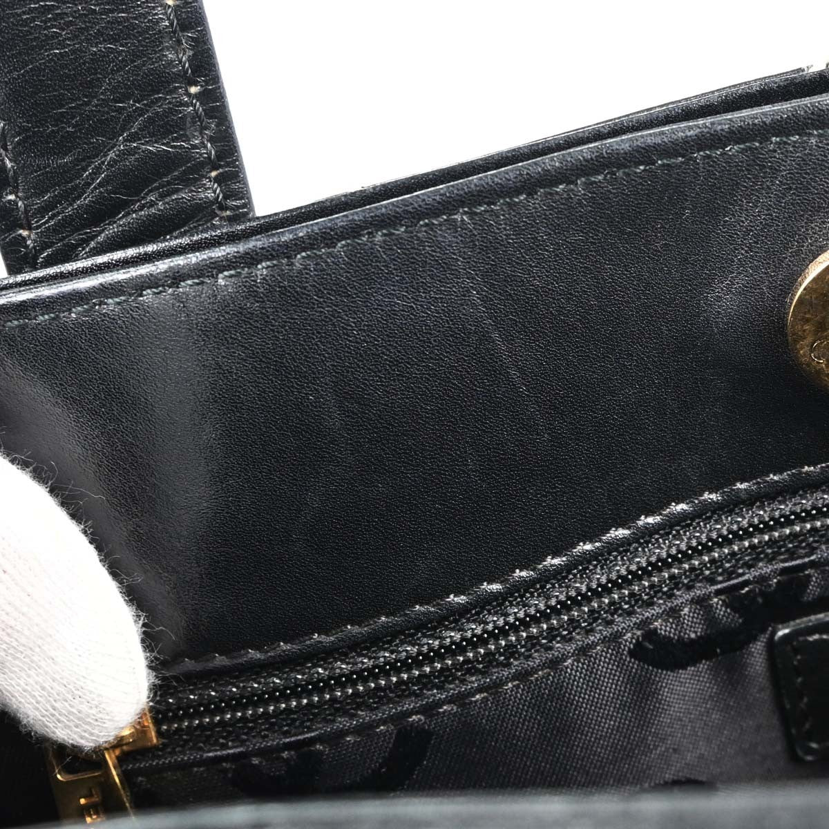 Chanel Surpique Quilted Leather Black Leather Tote Bag Bag (Pre-Owned)