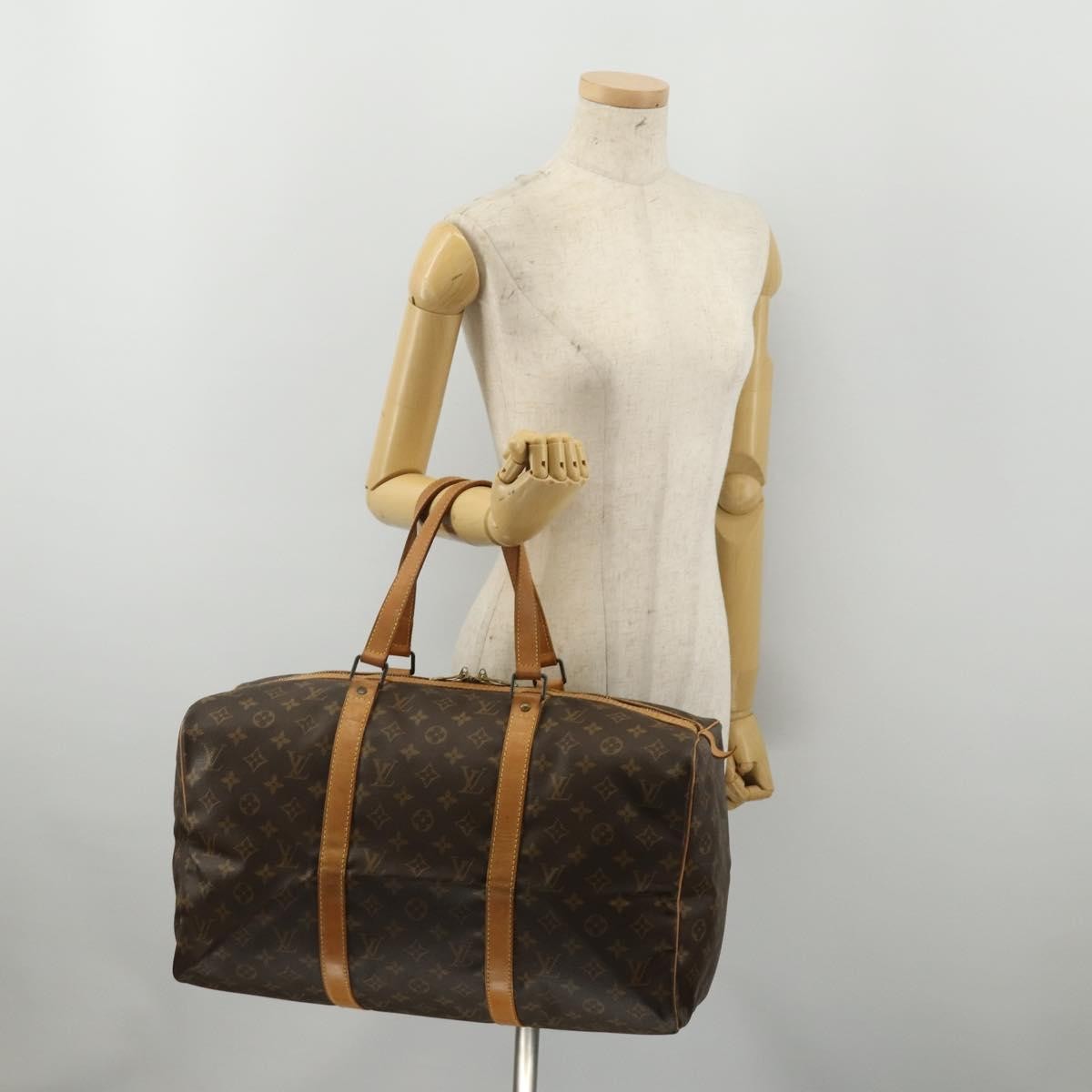 Louis Vuitton Sac Souple Monogram Canvas Brown Canvas Travel Bag Bag (Pre-Owned)
