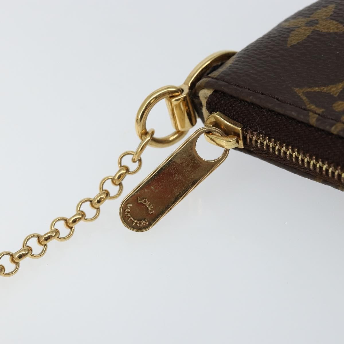 Louis Vuitton Milla Pochette Monogram Canvas Brown Canvas Clutche & Pouche Bag (Pre-Owned)