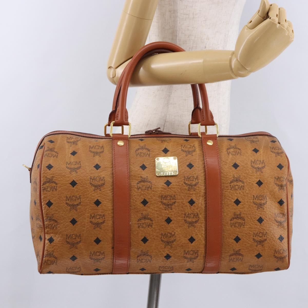MCM Vicetos Logogram Boston Brown Leather Travel Bag Bag (Pre-Owned)