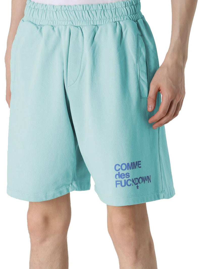 Comme Des Fuckdown Chic Light Blue Bermuda Shorts with Men's Logo