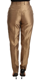 Dolce & Gabbana Elegant Tapered Silk Trousers in Women's Gold