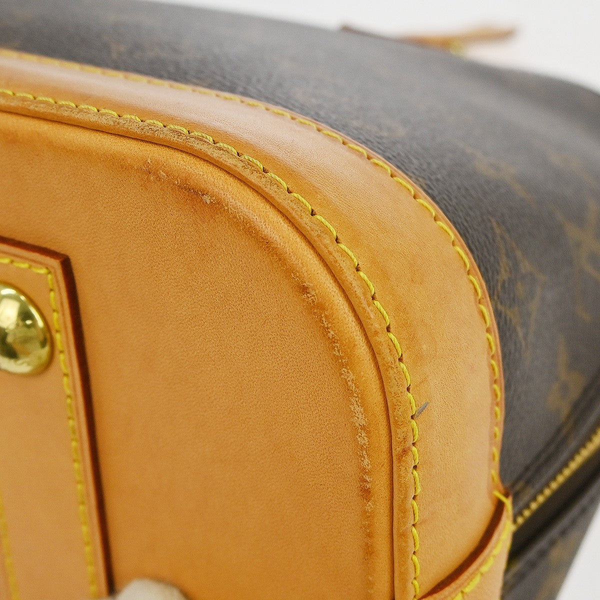 Louis Vuitton Alma Handbag Monogram Canvas Brown Canvas Handbag (Pre-Owned)