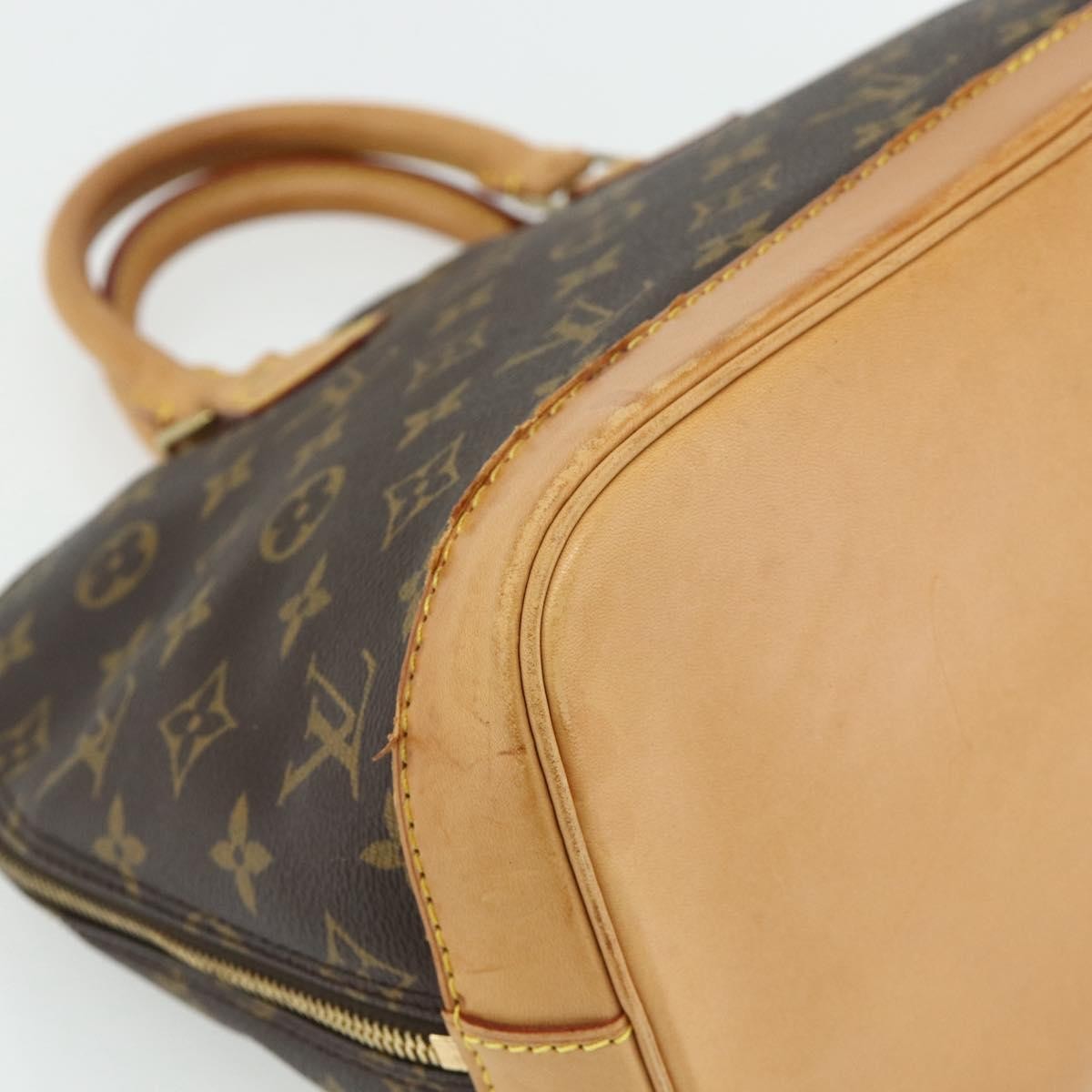 Louis Vuitton Alma Handbag Monogram Canvas Brown Canvas Handbag (Pre-Owned)