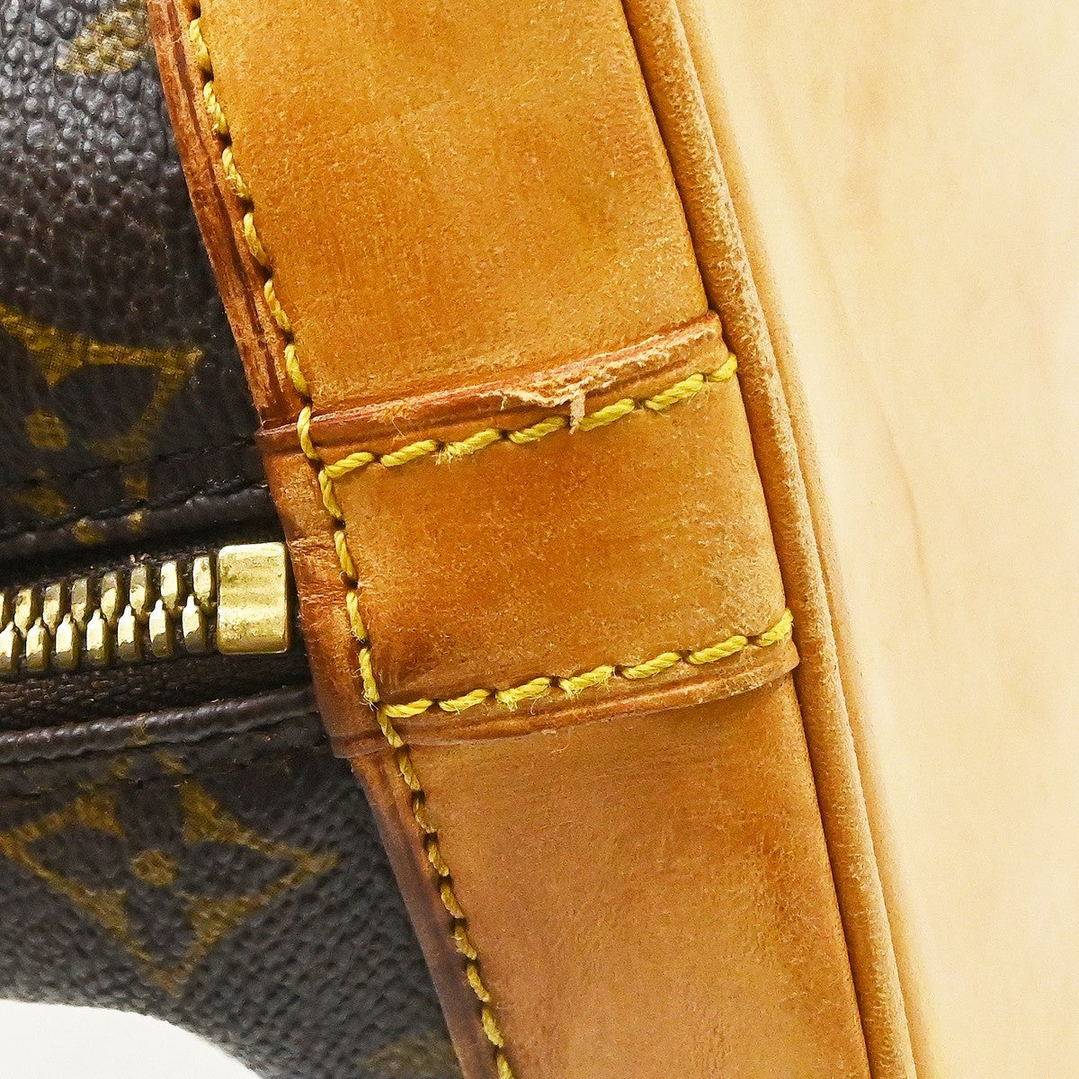 Louis Vuitton Alma Handbag Monogram Canvas Brown Canvas Handbag (Pre-Owned)