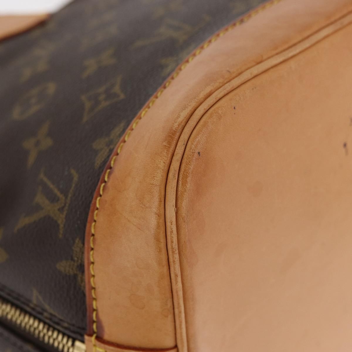 Louis Vuitton Alma Handbag Monogram Canvas Brown Canvas Handbag (Pre-Owned)
