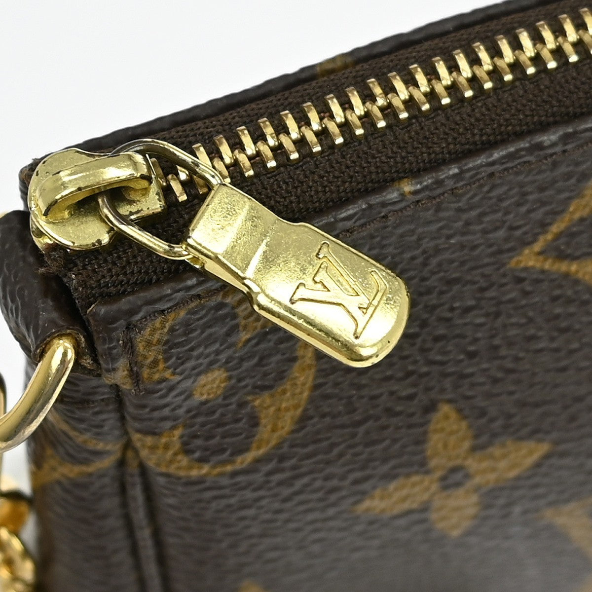 Louis Vuitton Mini Pochette Accessoires Canvas Brown Canvas Clutche & Pouche Bag (Pre-Owned)