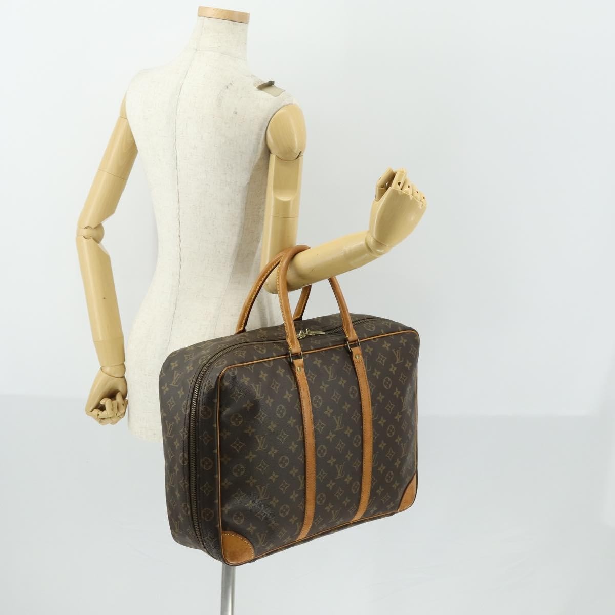 Louis Vuitton Sirius Handbag Monogram Canvas Brown Canvas Travel Bag Bag (Pre-Owned)