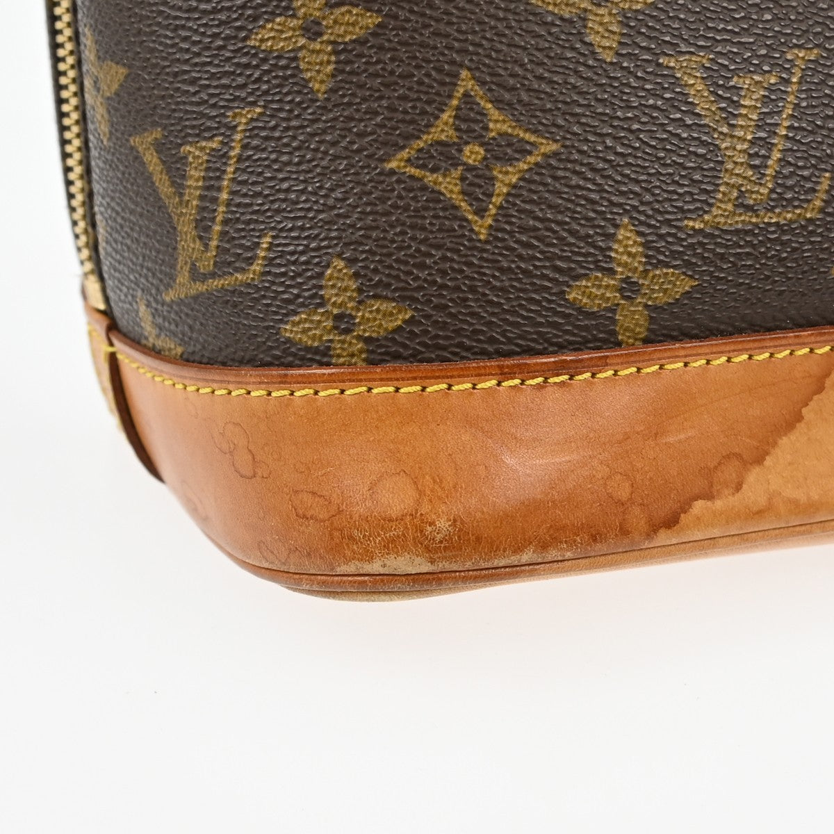 Louis Vuitton Alma Handbag Monogram Canvas Brown Canvas Handbag (Pre-Owned)