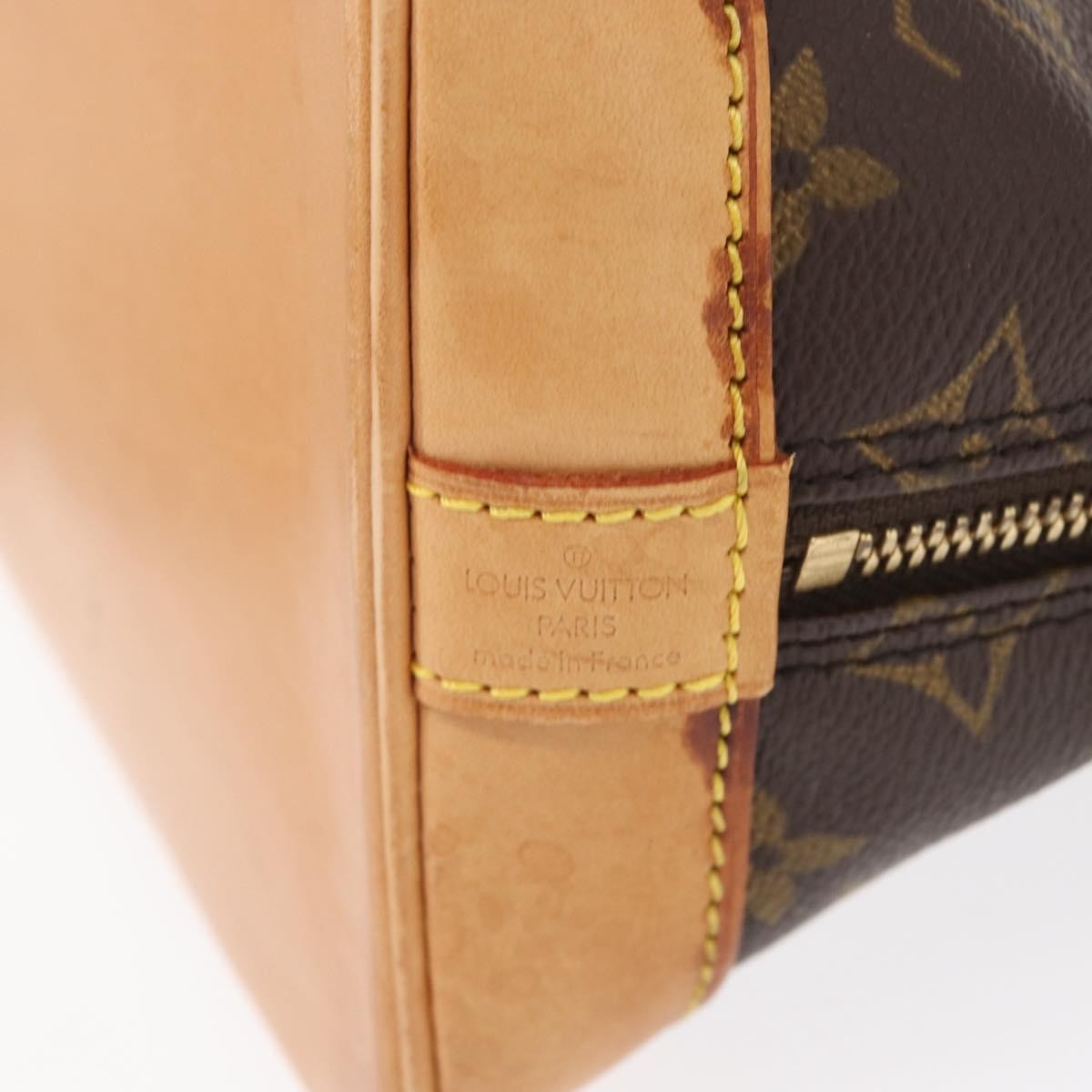 Louis Vuitton Alma Handbag Monogram Canvas Brown Canvas Handbag (Pre-Owned)