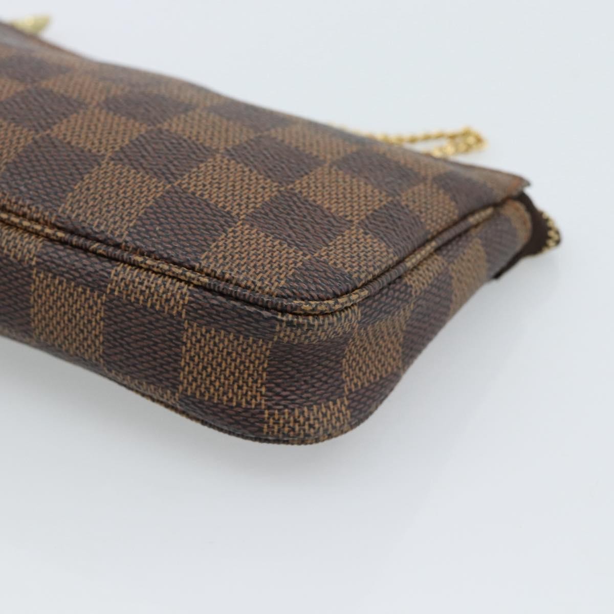 Louis Vuitton Mini Pochette Accessoires Damier Canvas Brown Canvas Clutche & Pouche Bag (Pre-Owned)