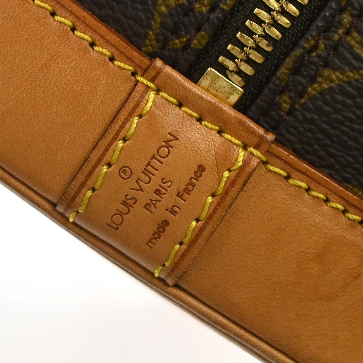 Louis Vuitton Alma Handbag Monogram Canvas Brown Canvas Handbag (Pre-Owned)