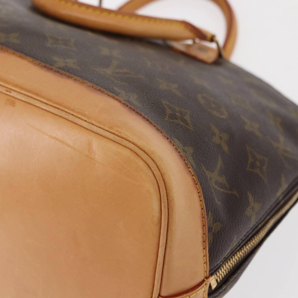 Louis Vuitton Alma Handbag Monogram Canvas Brown Canvas Handbag (Pre-Owned)