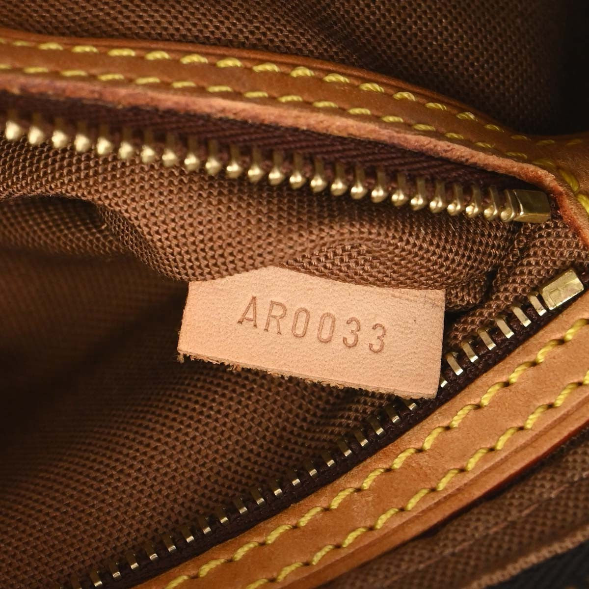 Louis Vuitton Trotteur Handbag Monogram Canvas Brown Canvas Clutche & Pouche Bag (Pre-Owned)