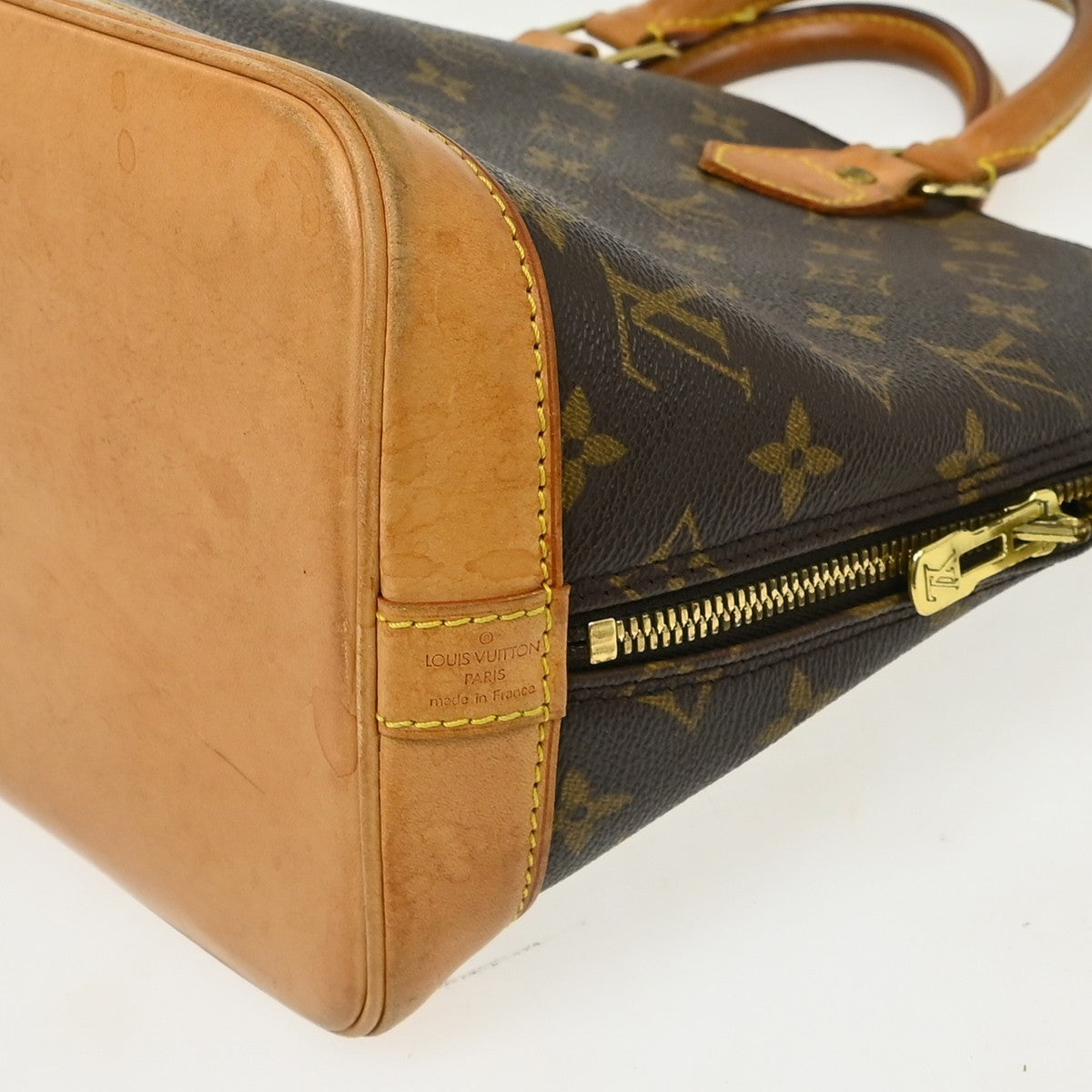 Louis Vuitton Alma Handbag Monogram Canvas Brown Canvas Handbag (Pre-Owned)