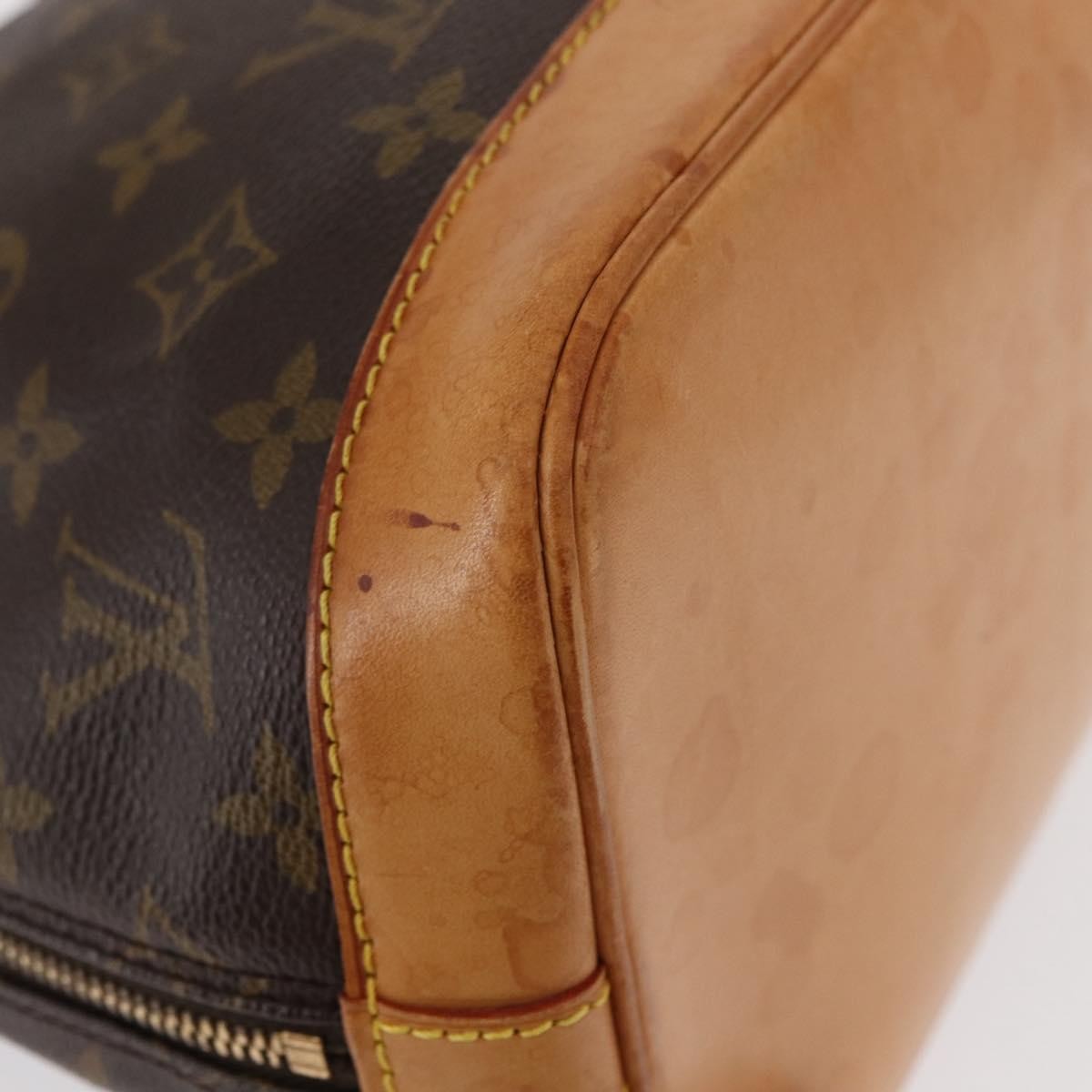 Louis Vuitton Alma Handbag Monogram Canvas Brown Canvas Handbag (Pre-Owned)