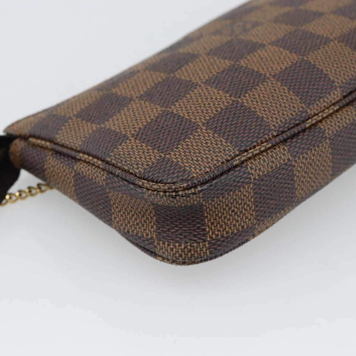 Louis Vuitton Mini Pochette Accessoires Damier Canvas Brown Canvas Clutche & Pouche Bag (Pre-Owned)