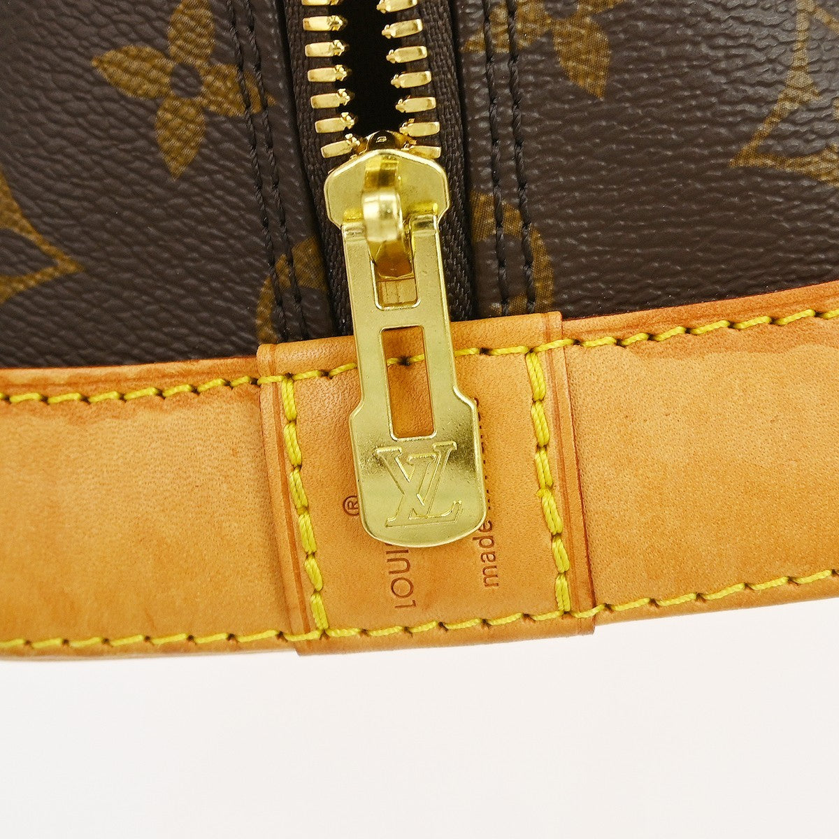 Louis Vuitton Alma Handbag Monogram Canvas Brown Canvas Handbag (Pre-Owned)