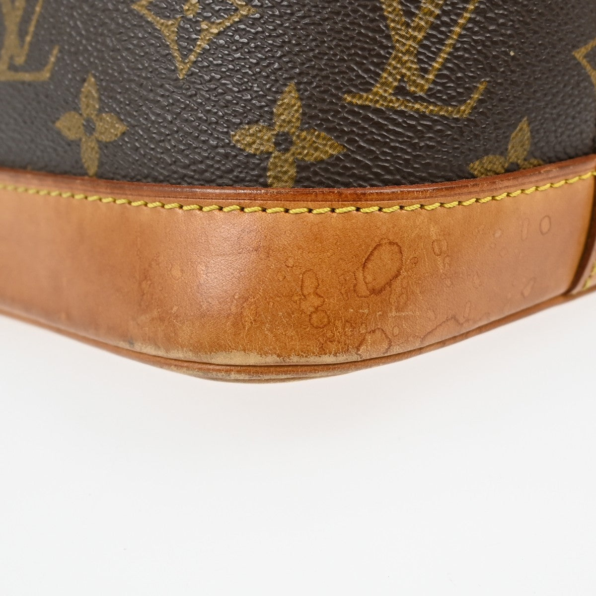 Louis Vuitton Alma Handbag Monogram Canvas Brown Canvas Handbag (Pre-Owned)