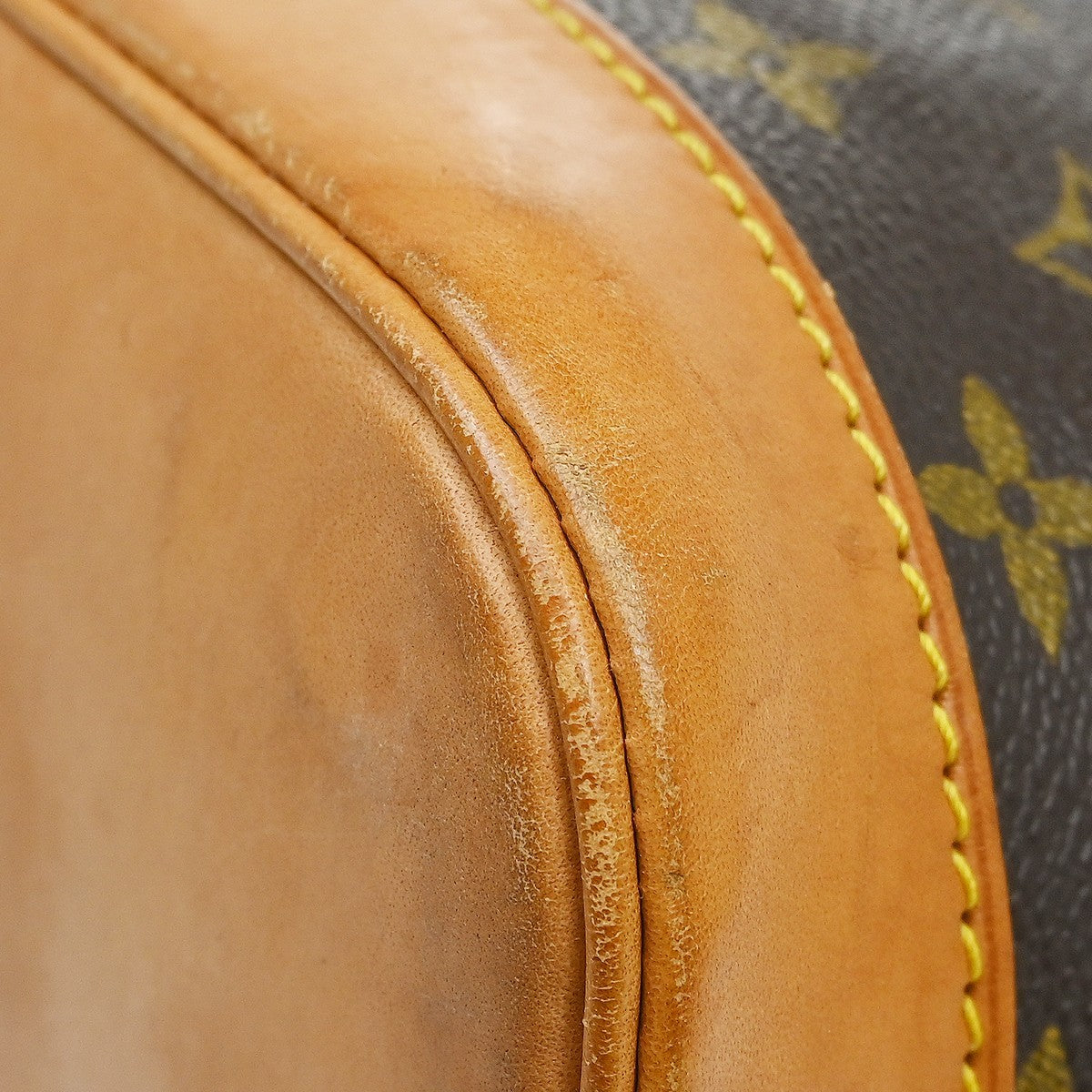 Louis Vuitton Alma Handbag Monogram Canvas Brown Canvas Handbag (Pre-Owned)