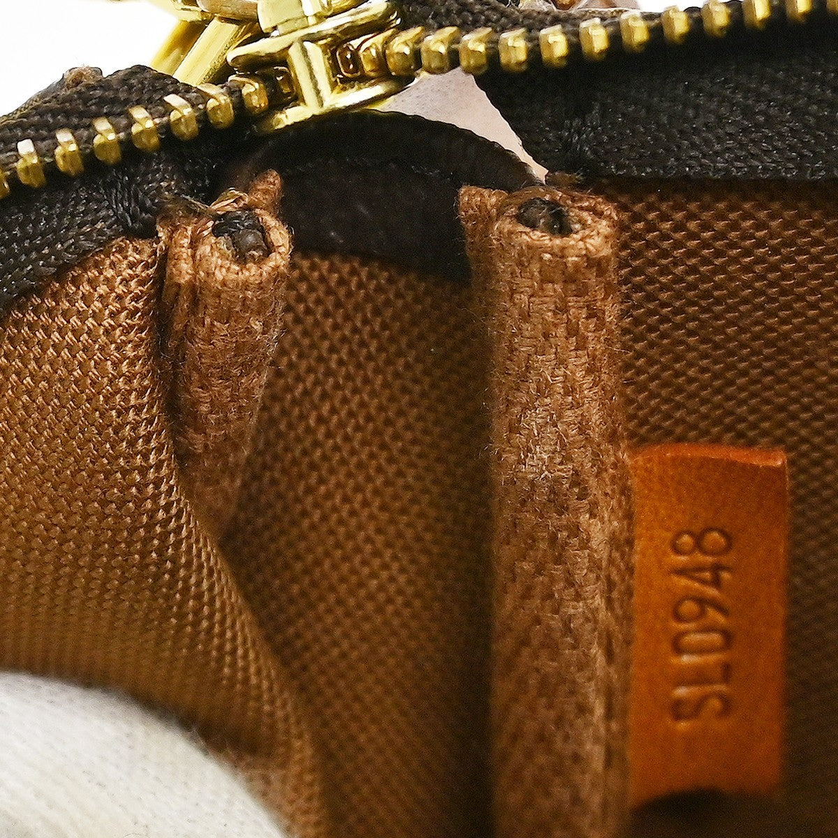 Louis Vuitton Pochette Accessoires Nm Monogram Canvas Brown Canvas Clutche & Pouche Bag (Pre-Owned)
