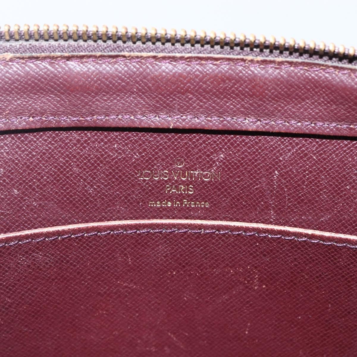 Louis Vuitton Pochette Baikal Clutch Taiga Leather Burgundy Leather Clutche & Pouche Bag (Pre-Owned)