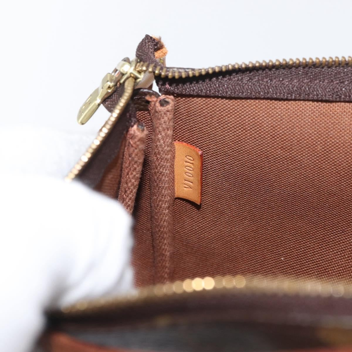 Louis Vuitton Pochette Accessoires Nm Monogram Canvas Brown Canvas Clutche & Pouche Bag (Pre-Owned)