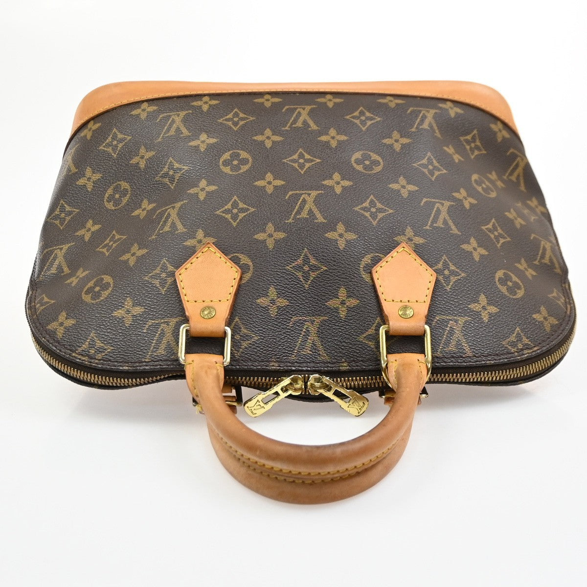 Louis Vuitton Alma Handbag Monogram Canvas Brown Canvas Handbag (Pre-Owned)