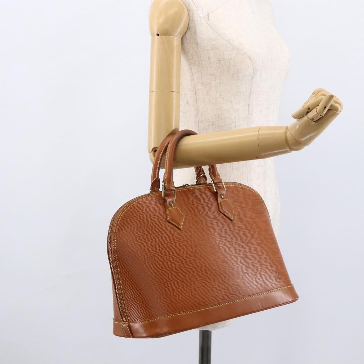 Louis Vuitton Alma Handbag Epi Leather Brown Leather Handbag (Pre-Owned)