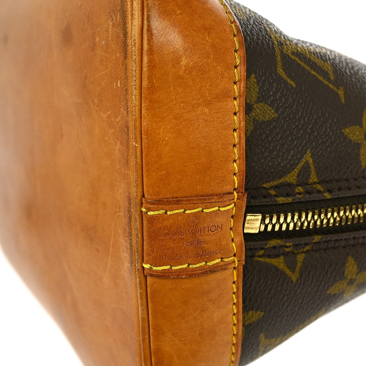 Louis Vuitton Alma Handbag Monogram Canvas Brown Canvas Handbag (Pre-Owned)