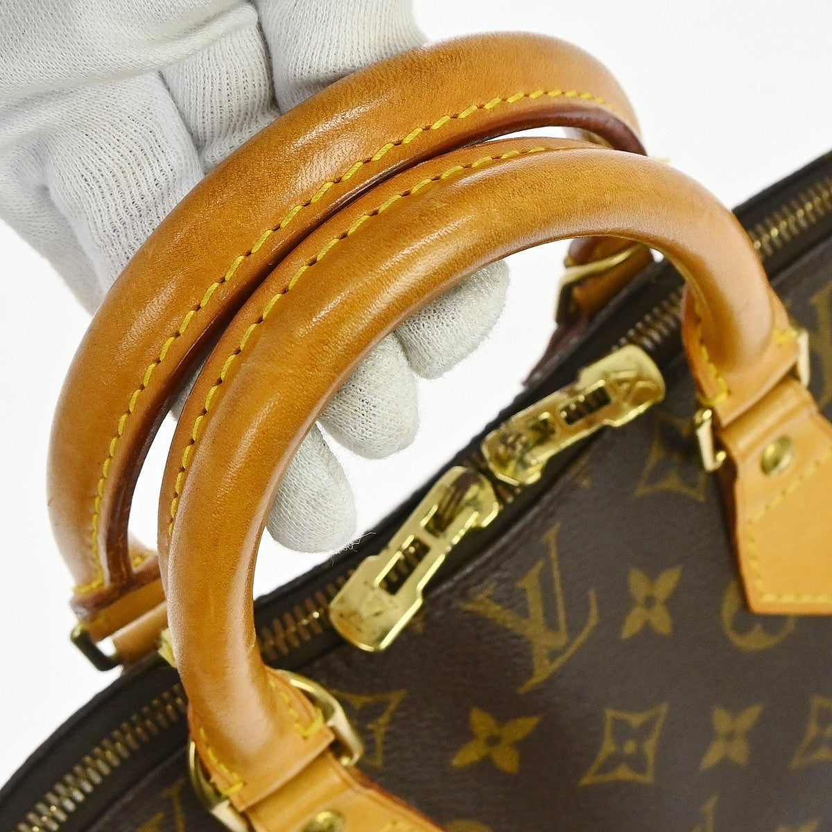 Louis Vuitton Alma Handbag Monogram Canvas Brown Canvas Handbag (Pre-Owned)