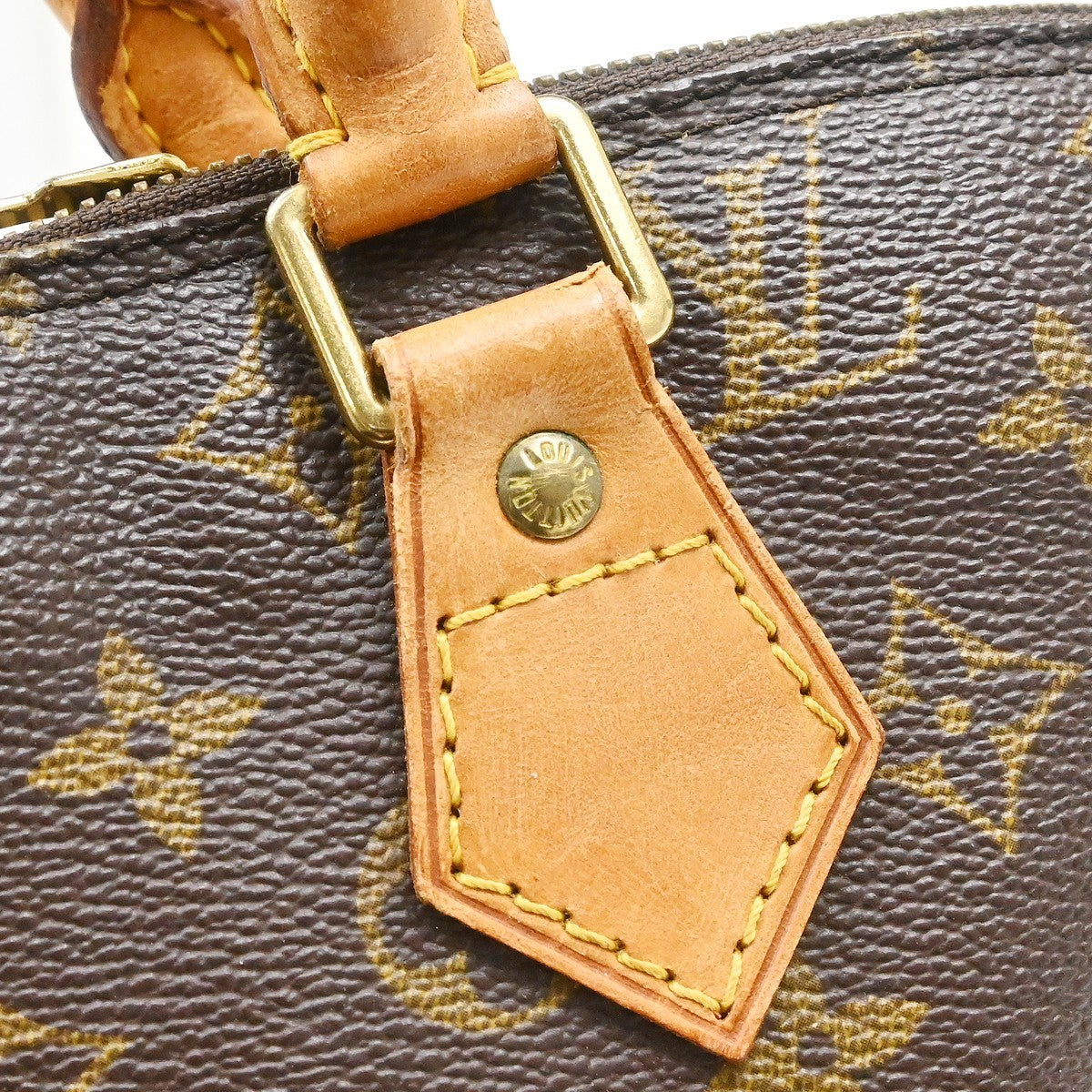 Louis Vuitton Alma Handbag Monogram Canvas Brown Canvas Handbag (Pre-Owned)